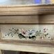 exotic wood console with a drawer