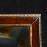 Mirror style restoration enhances brass mahogany
