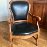 Wood and leather armchair