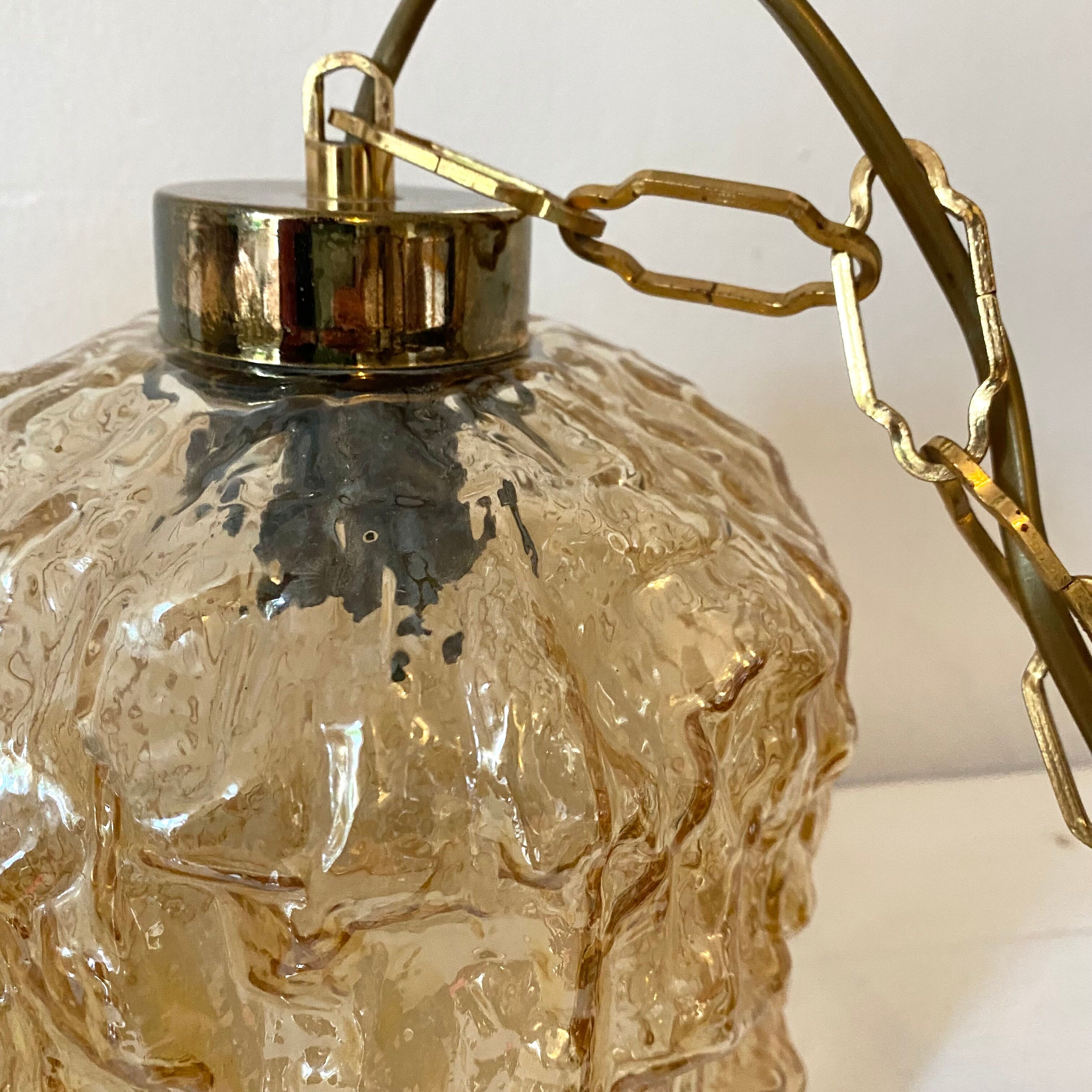 Pair of vintage amber glass pendant lamps