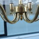 Golden chandelier 6 bevelled smoky glass lights