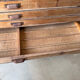Low workshop cabinet with 8 drawers in solid wood, printing style.