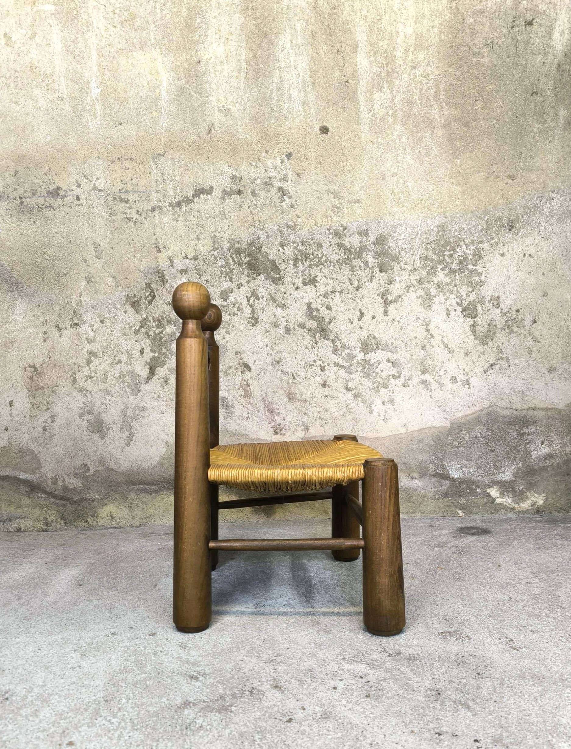 Vintage low chair in wood and straw