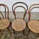 Set of 10 bentwood bistro chairs with cane seat.