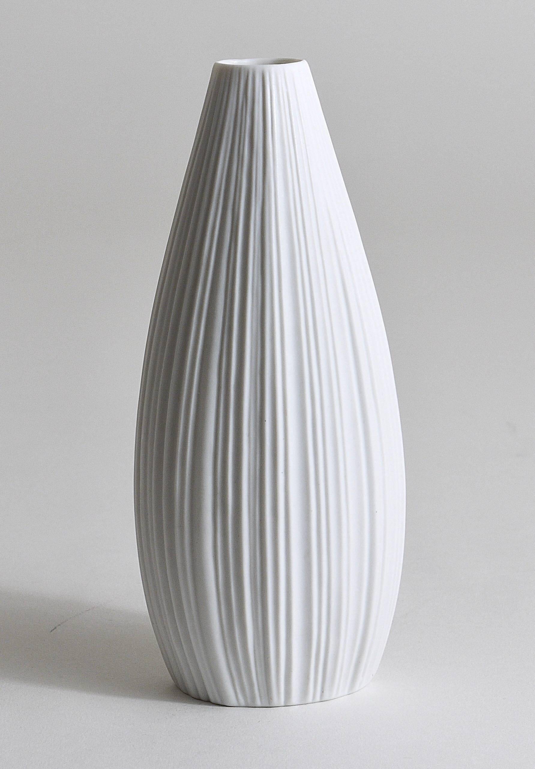 White porcelain vase with striped relief by Rosenthal, designed by Martin Freyer, Germany, 1960s.