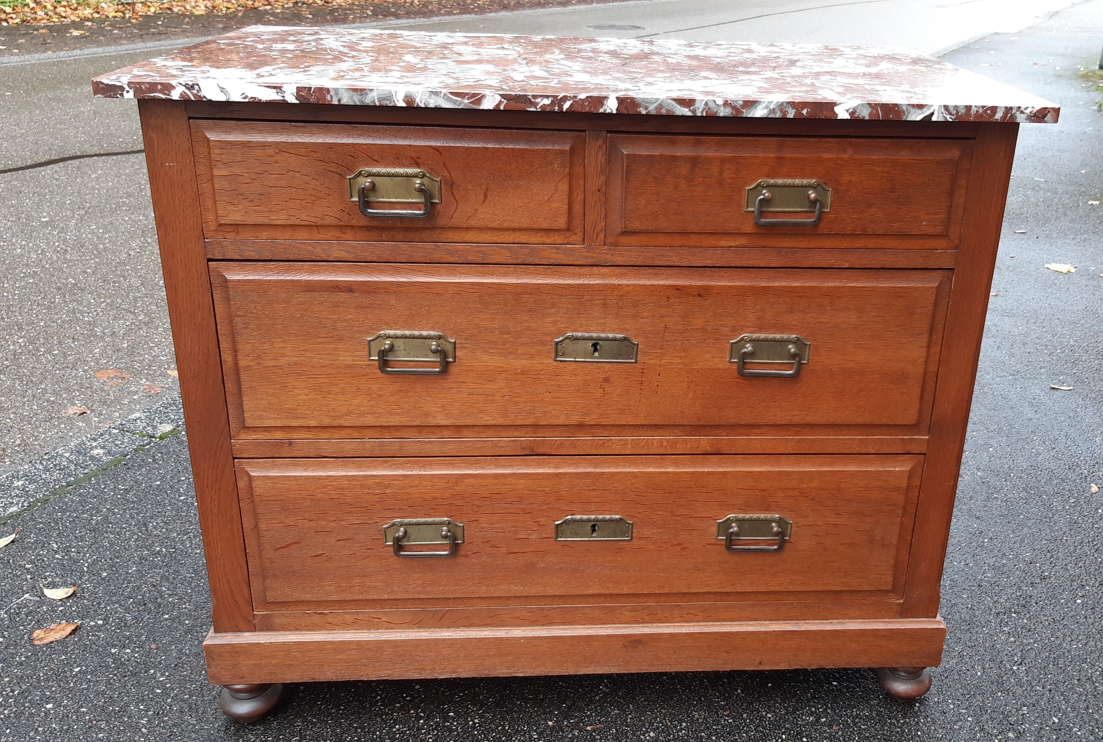 Oak chest of drawers and art deco marble.