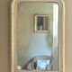 Antique Louis-Philippe mirror with pearls and shells, white patina.
