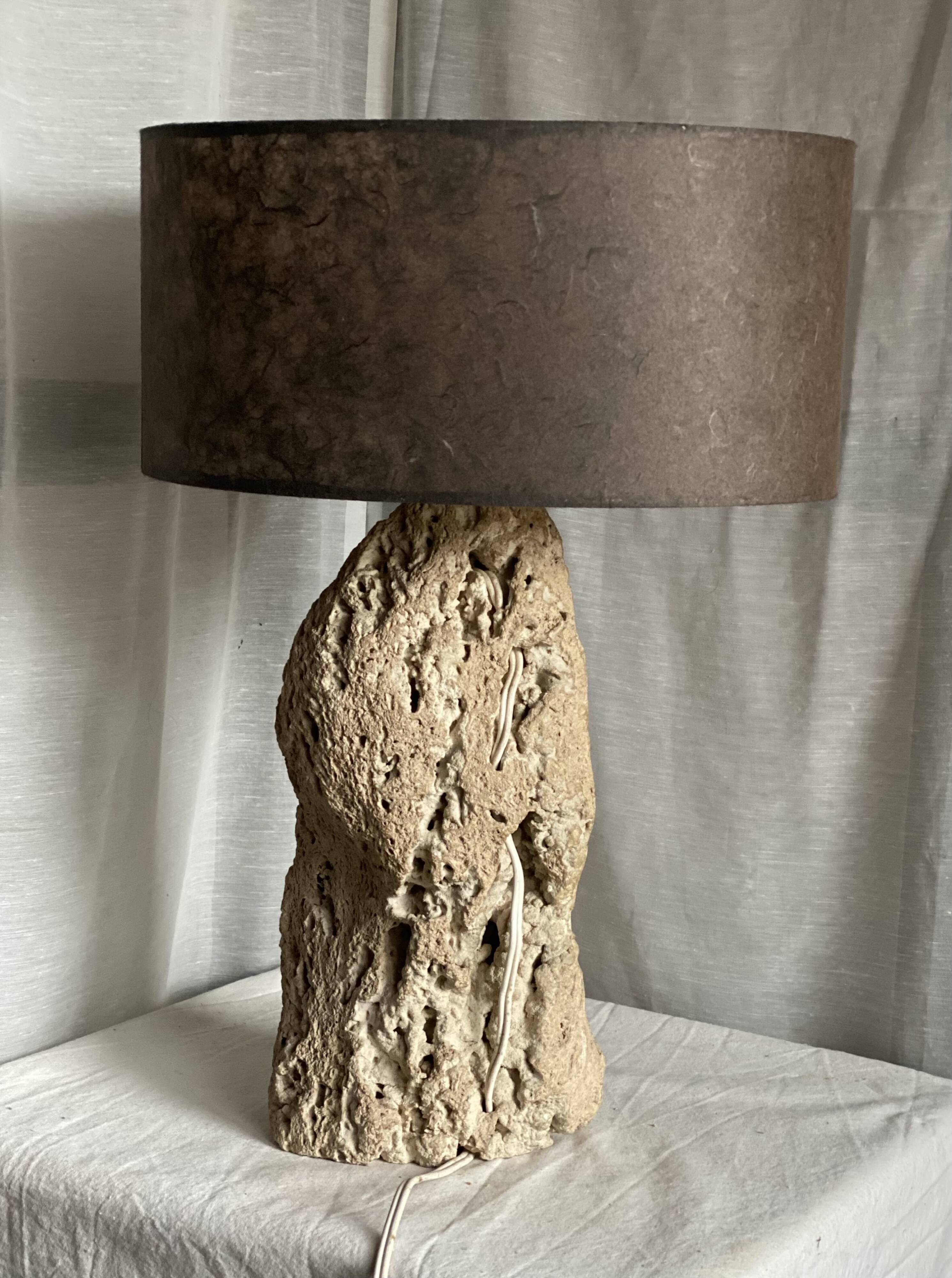 Brutalist vintage stone lamp from the 1970s, raw art.