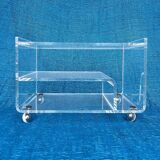 Translucent plexiglass storage drawer/cabinet on wheels.