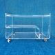 Translucent plexiglass storage drawer/cabinet on wheels.