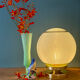 Lampe à poser globe vintage en verre granité vert et doré