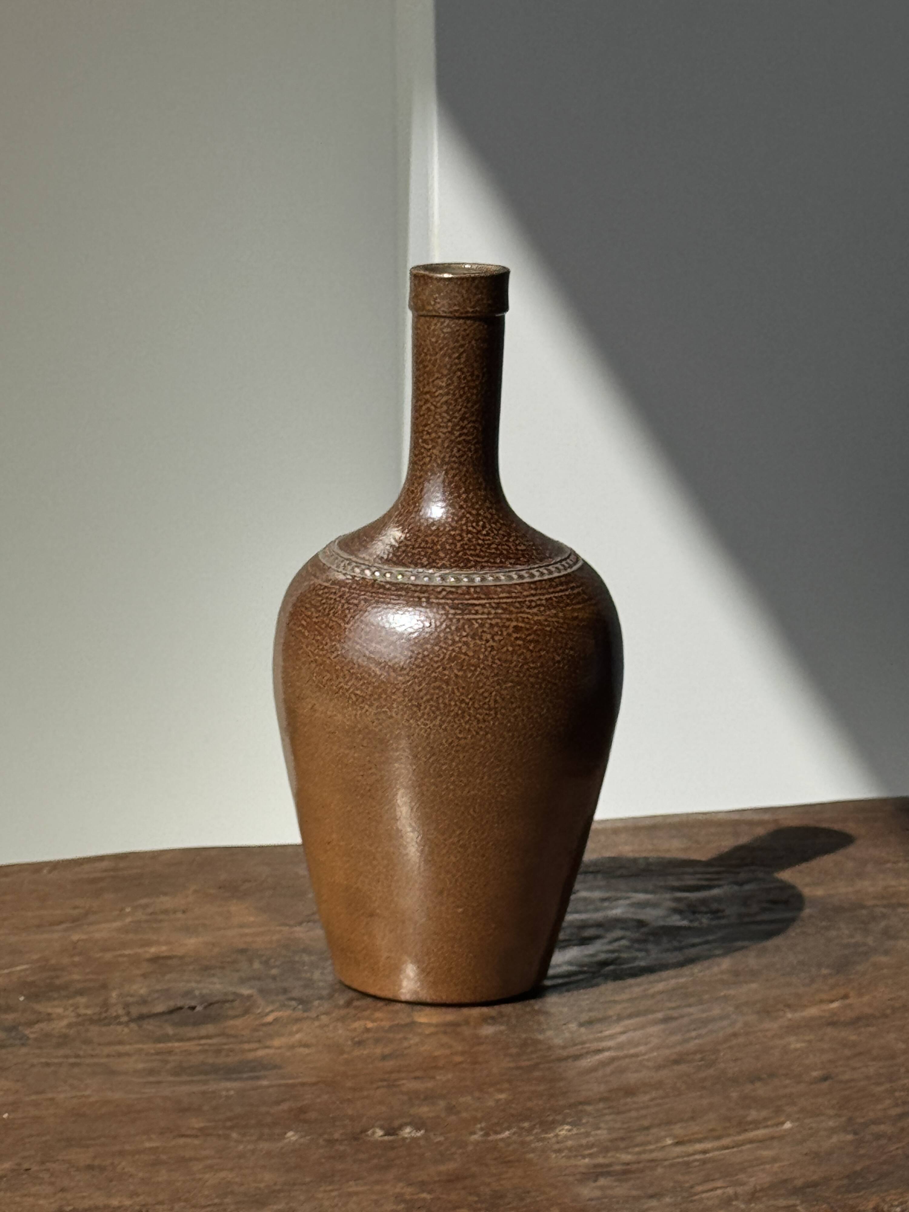 Sandstone demijohn in Pont des Vernes, France