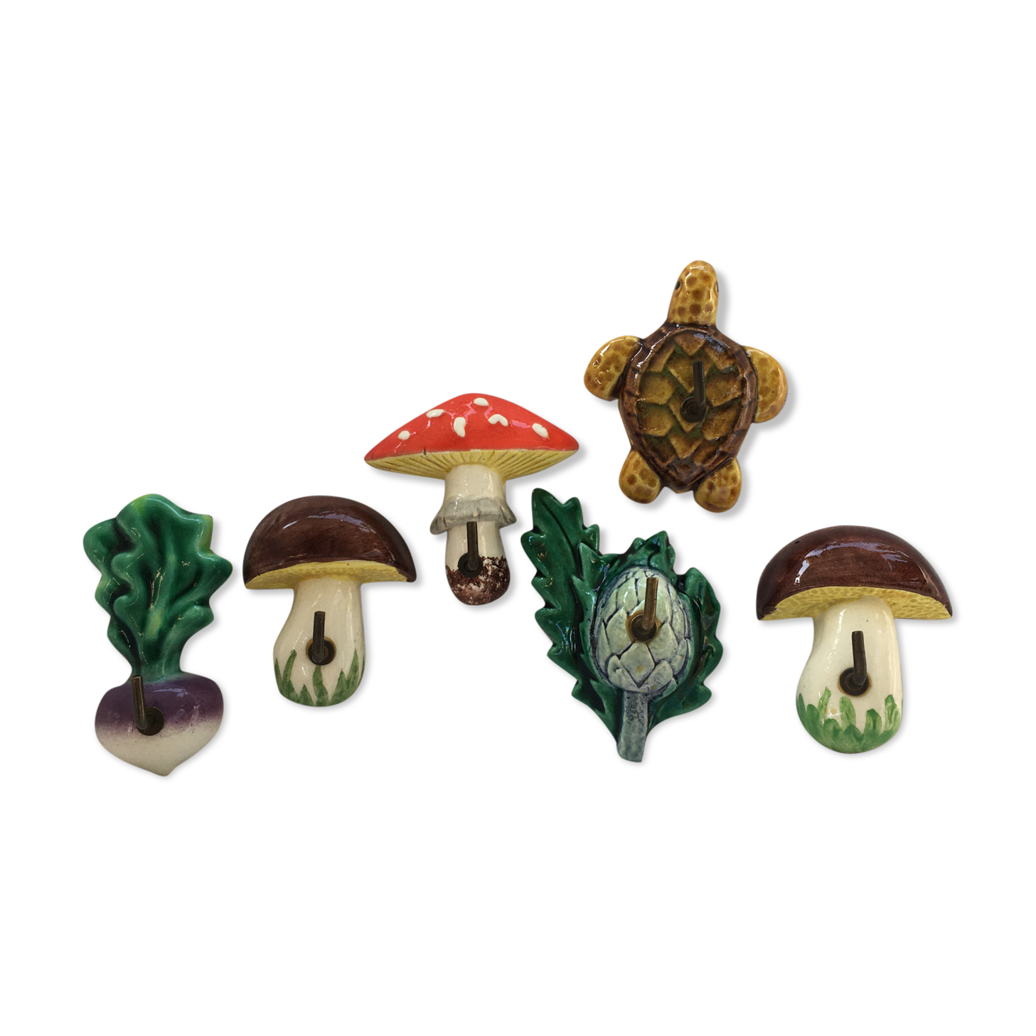 Lot of slurry hooks in the shape of plants and animals