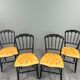 Set of four Napoleon III chairs in blackened wood, 19th century.
