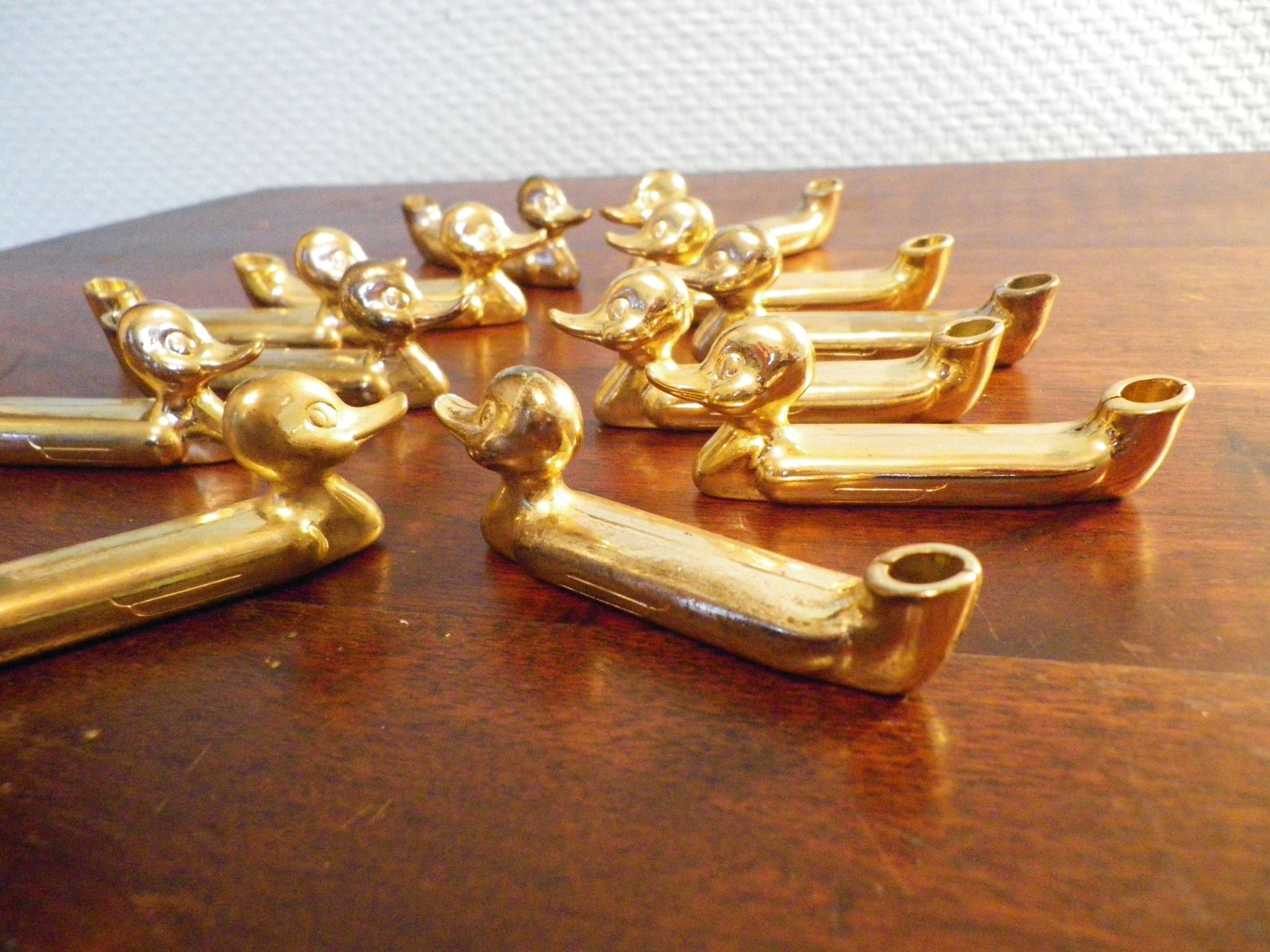 Box of 12 knife holders in silver metal, shape of canrds, 60s