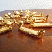 Box of 12 knife holders in silver metal, shape of canrds, 60s
