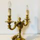 Chandelier en bronze à décors de putti et cariatides, début XXe