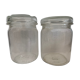 Two old vintage white glass jars