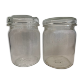 Two old vintage white glass jars