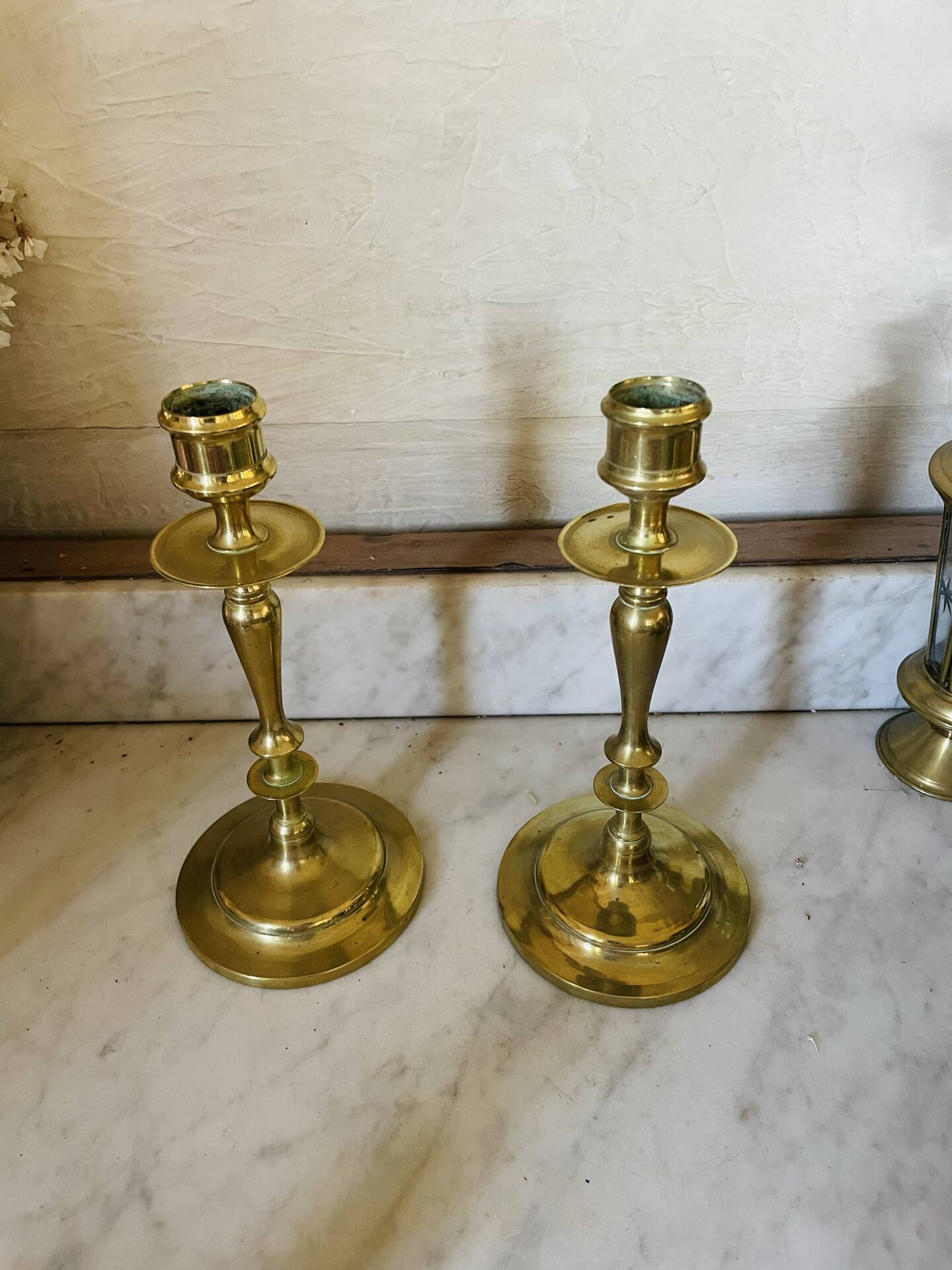 Old pair of turned brass candlesticks
