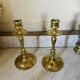 Old pair of turned brass candlesticks