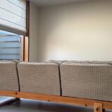 Two vintage Swedish sofas and a pine table