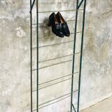 Rigid metal shoe shelf on legs - 1950