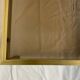 Glass and brass coffee table