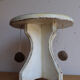 Small wooden stool painted with a star design.