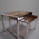 Vintage 1970s nesting tables in chrome and smoked glass, mid-century modernist style