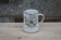 Decorated earthenware pitcher – signed Duncan Marais