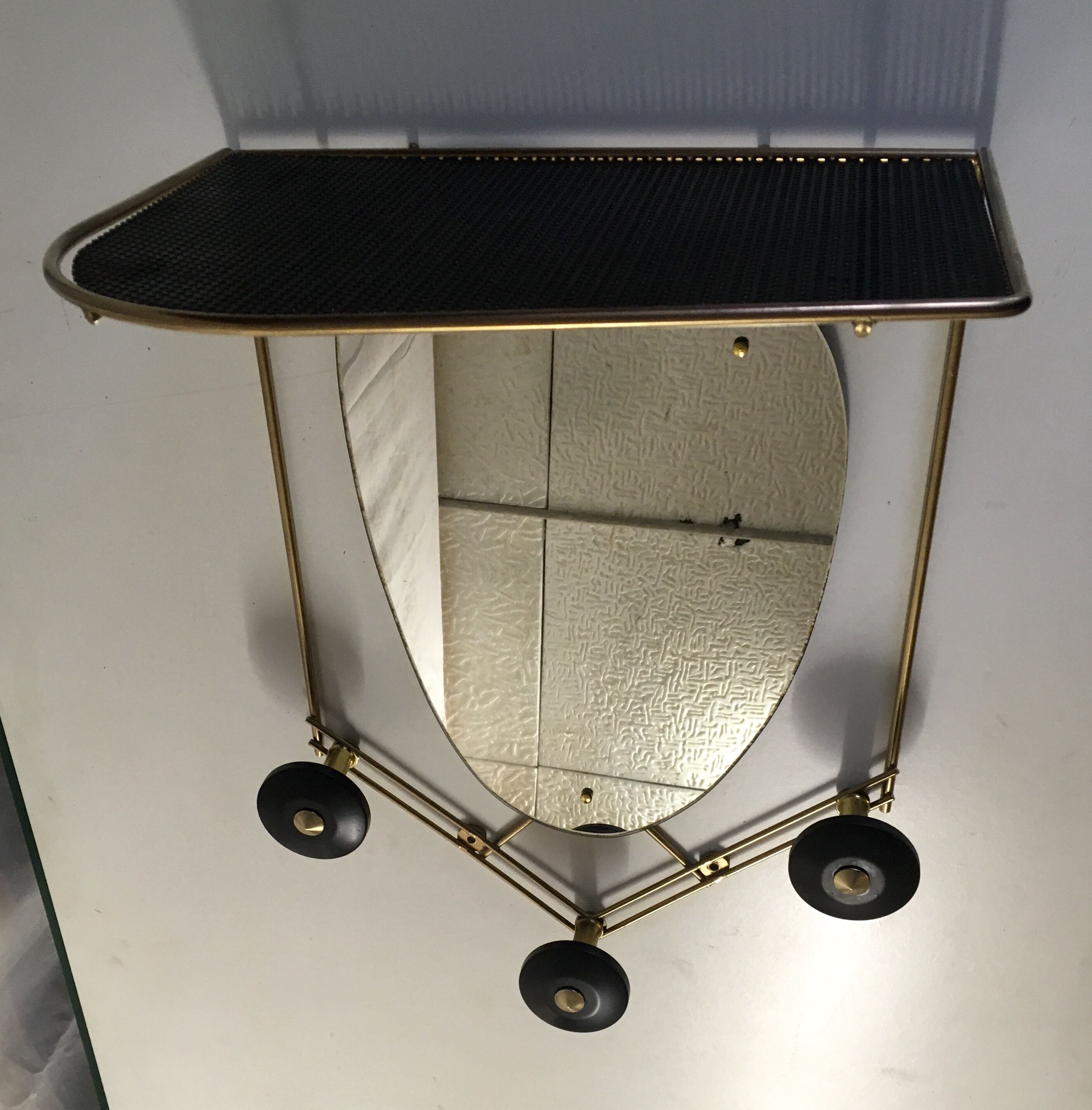 Black and gold metal coat rack., 1950
