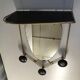 Black and gold metal coat rack., 1950