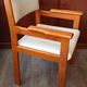 Armchair by André Sornay, stained solid beech & beige faux leather. 1980