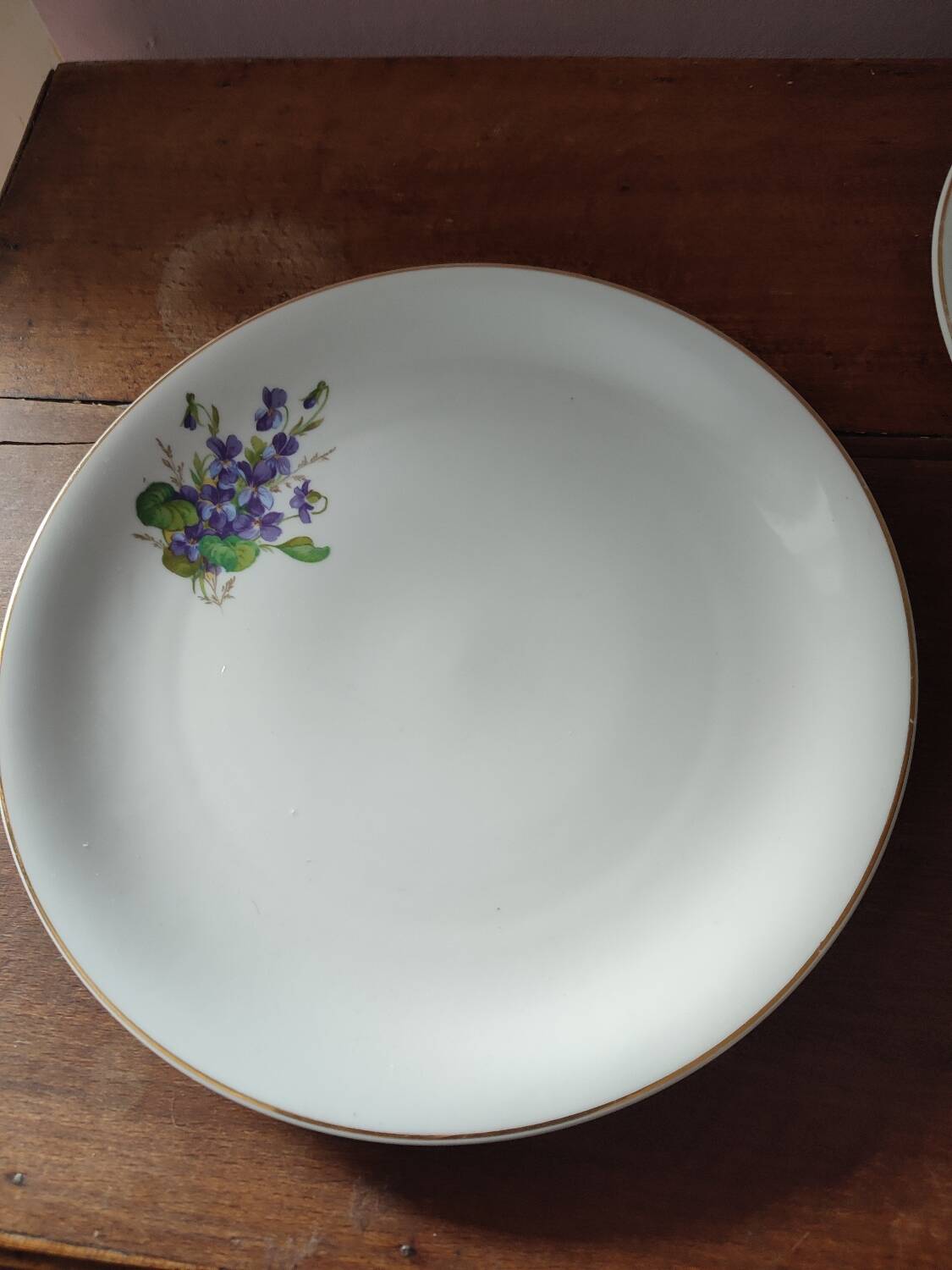 Set of 11 plates, Baudour porcelain