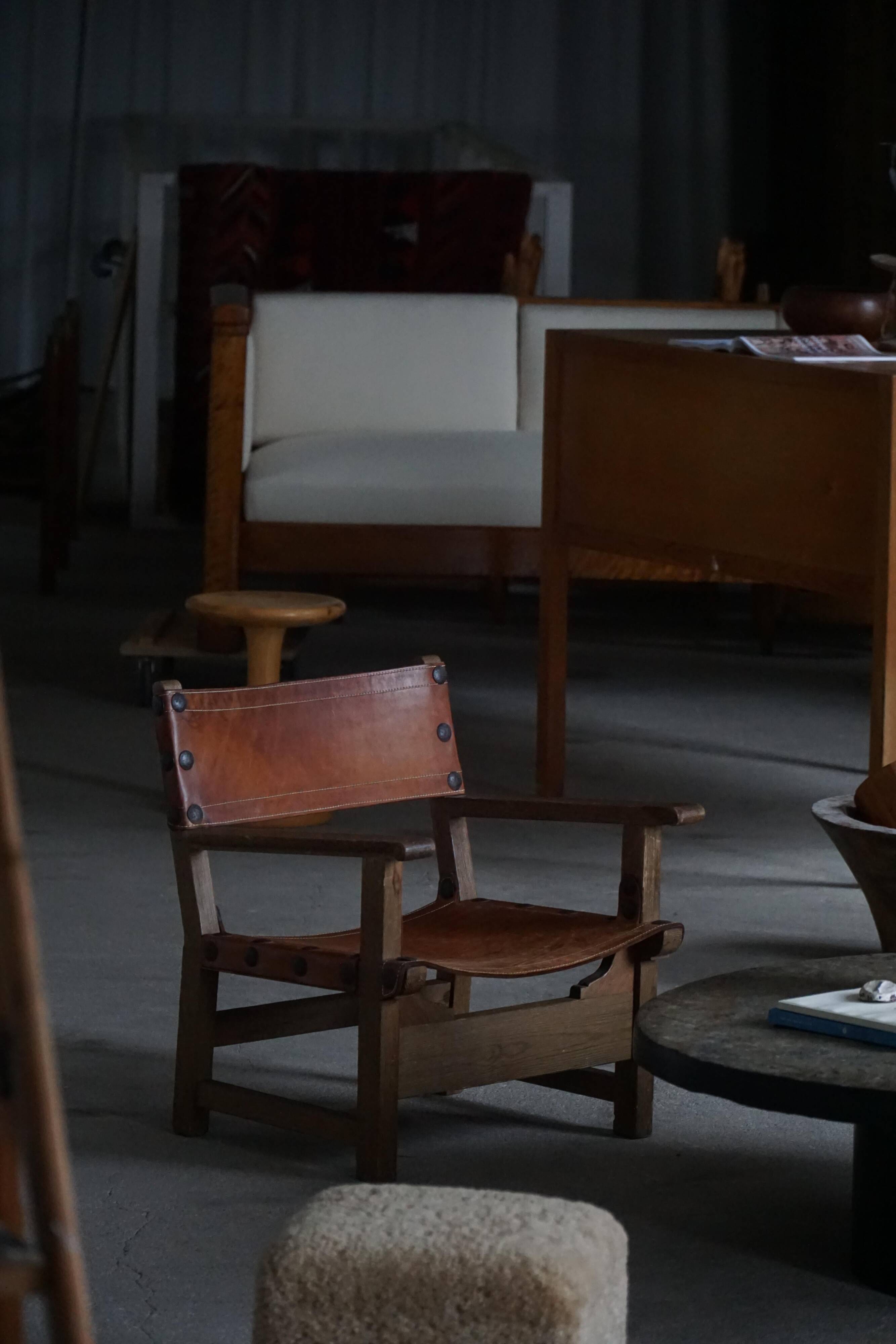 Pair of Spanish brutalist armchairs from the 1960s, wood and leather.