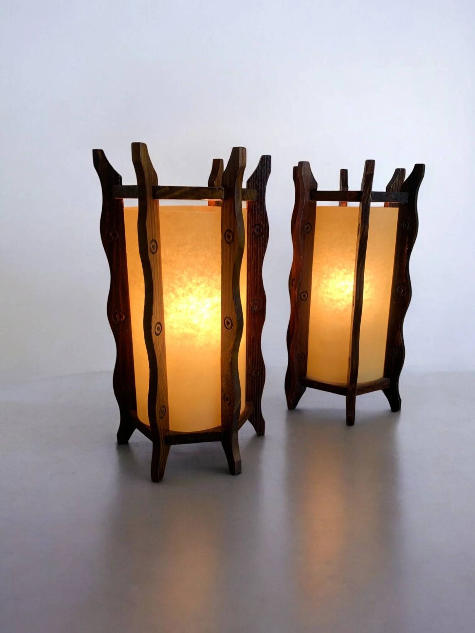 Pair of brutalist table lamps, wood & parchment, France, 1970s