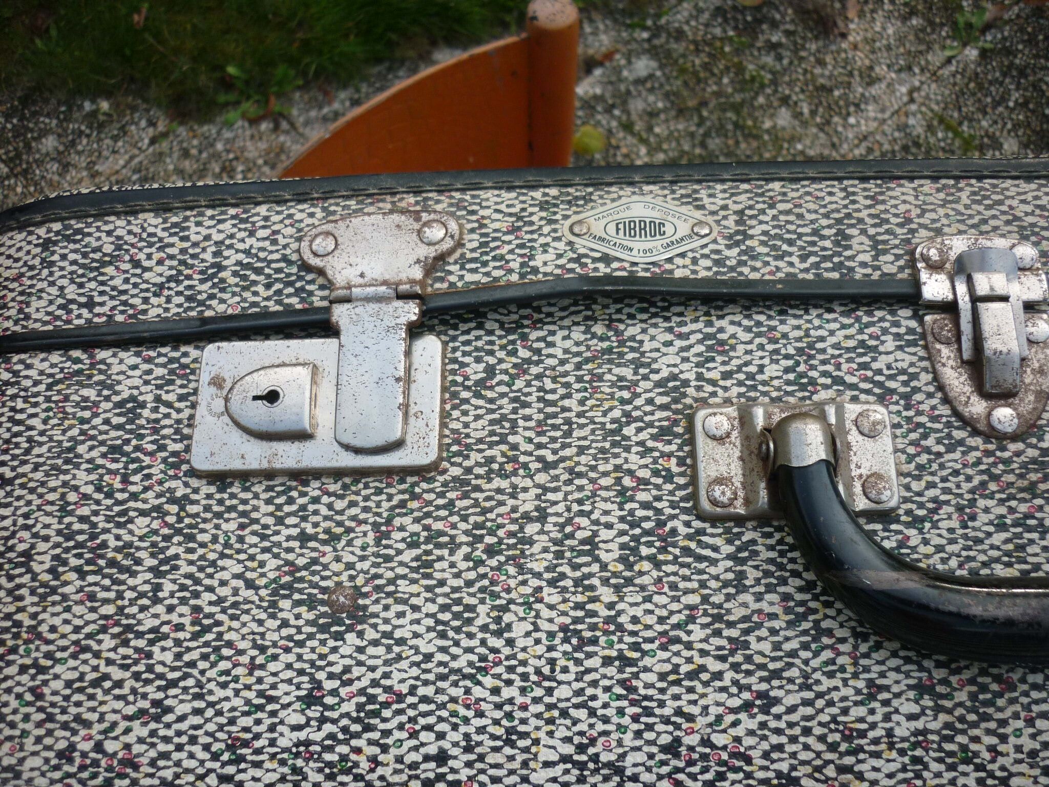 Antique black and white fibroc suitcase