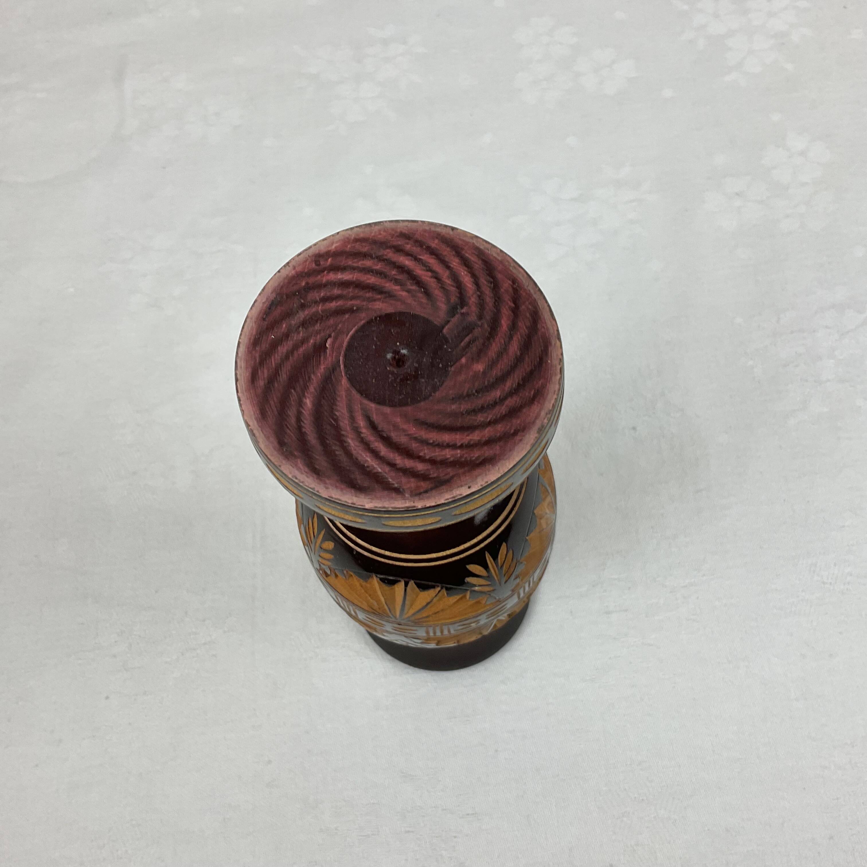 Carved wooden vase
