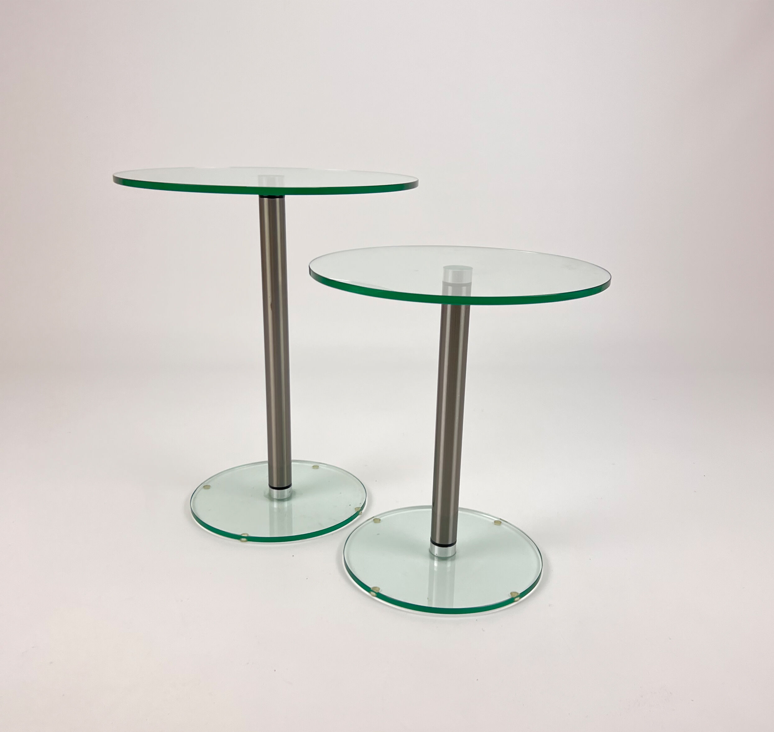 Set of 2 postmodern glass and steel side tables, 1990s