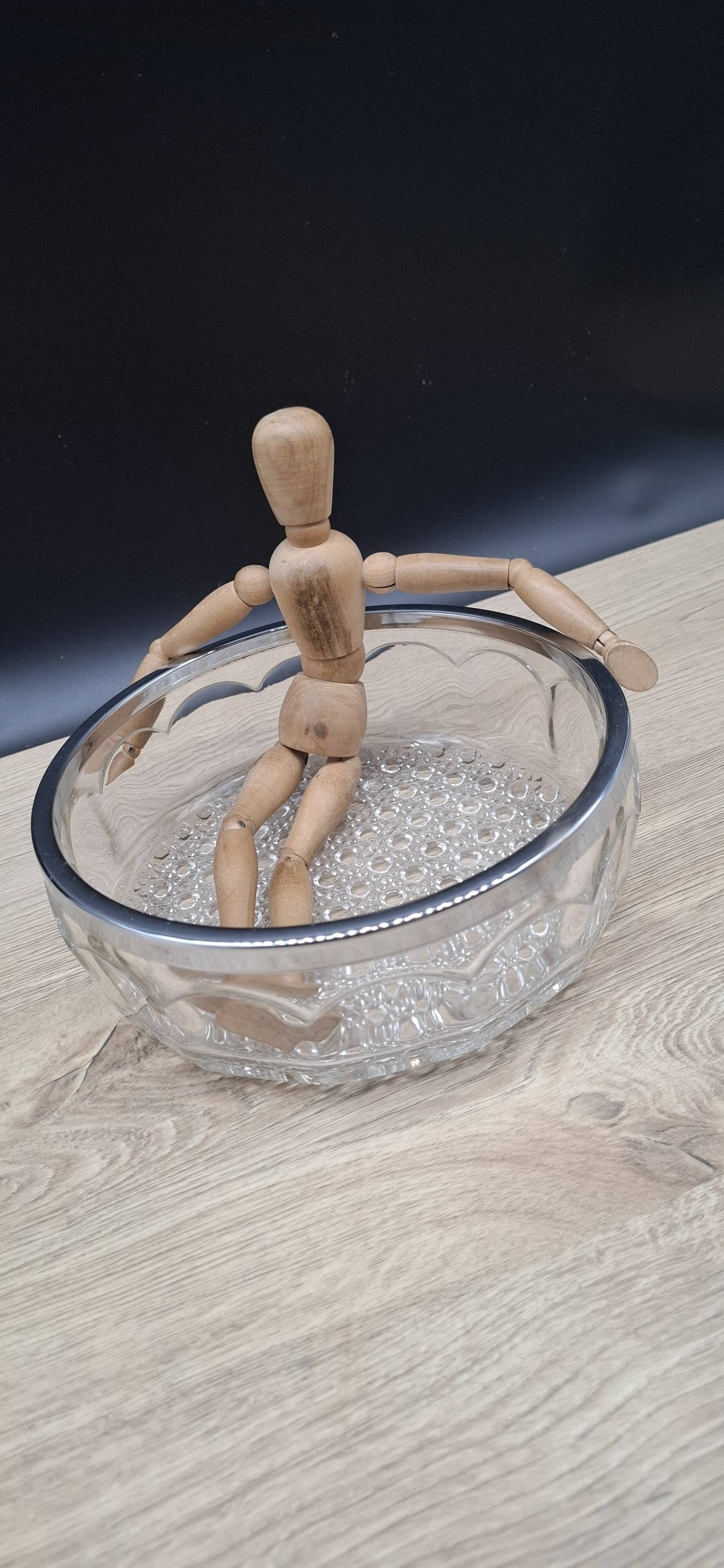 Chiseled glass salad bowl with metal rim