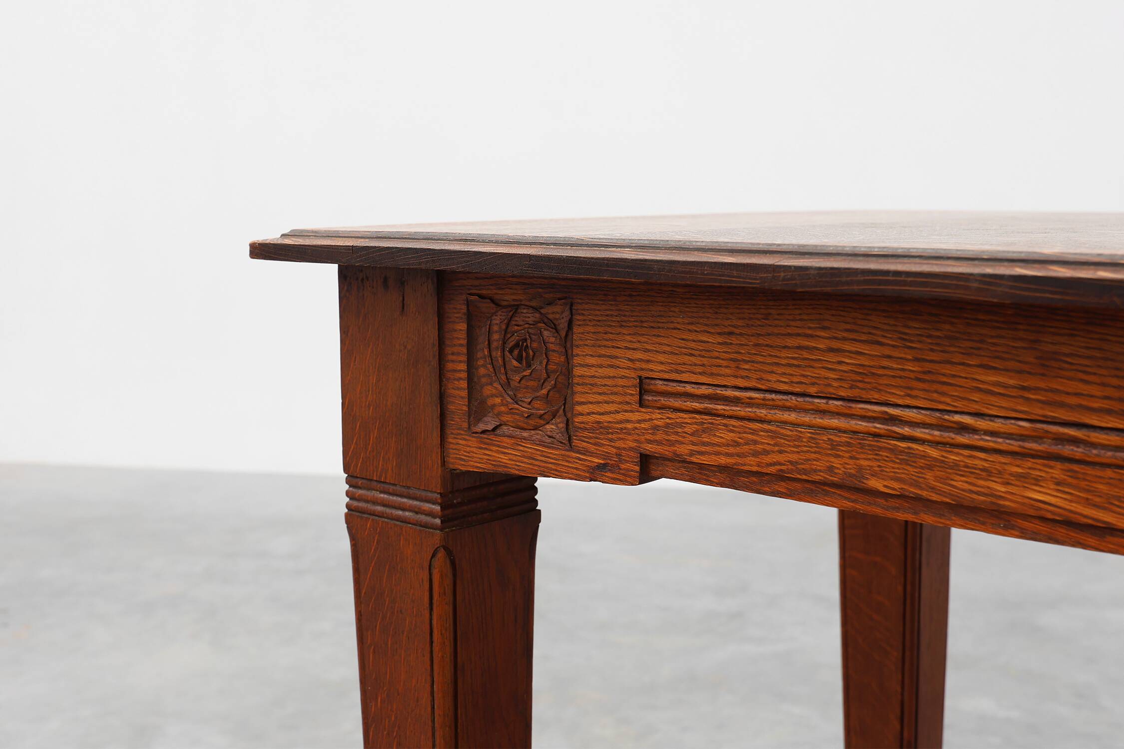 Oak Art Deco dining table with carved frieze, France 1920s