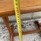 Small side table or bistro serving table with curved wood.