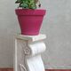 Column pedestal in sculpted Carrara marble