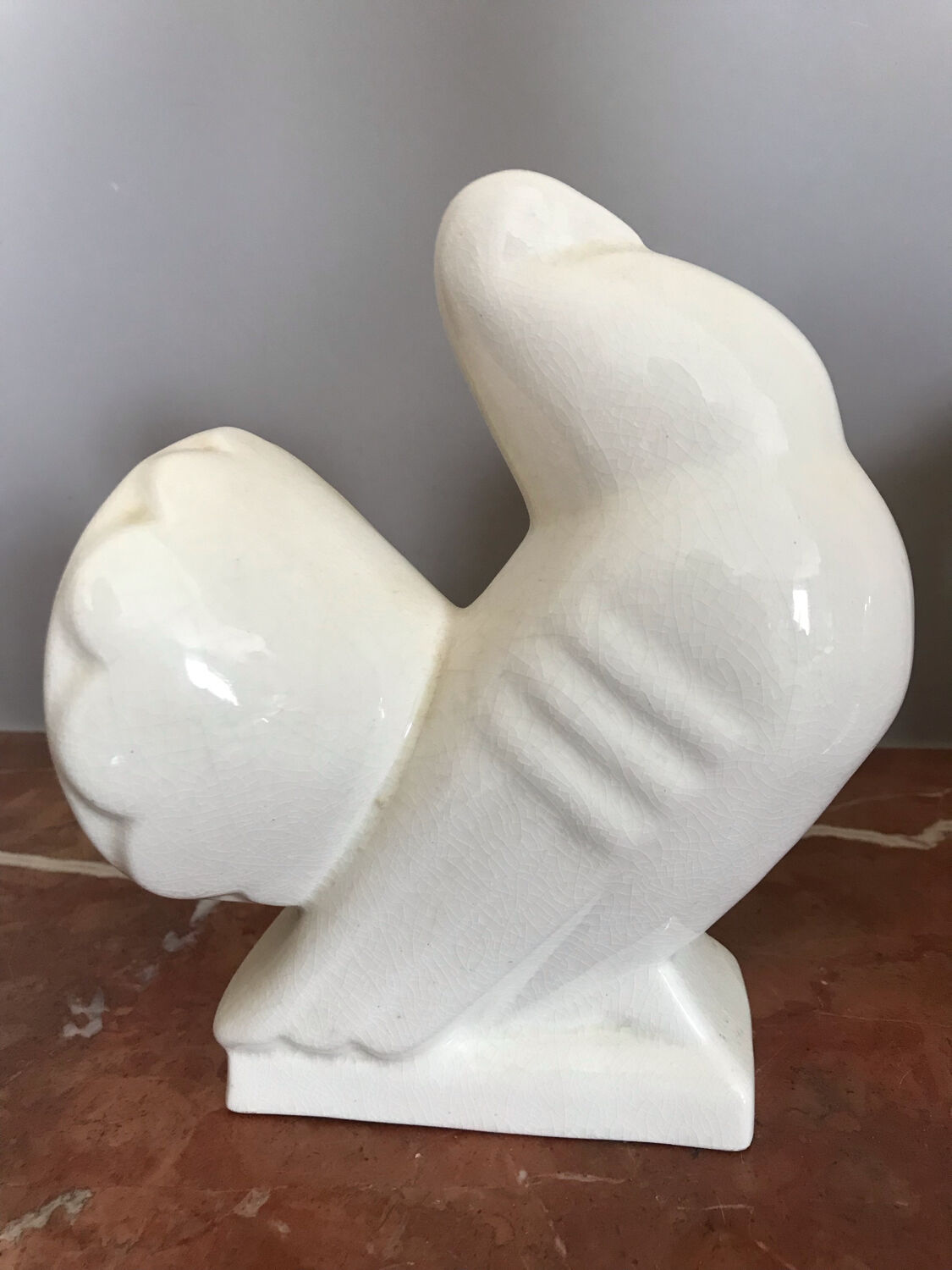 Pair of bookends in ceramic art deco cracked pigeons signed