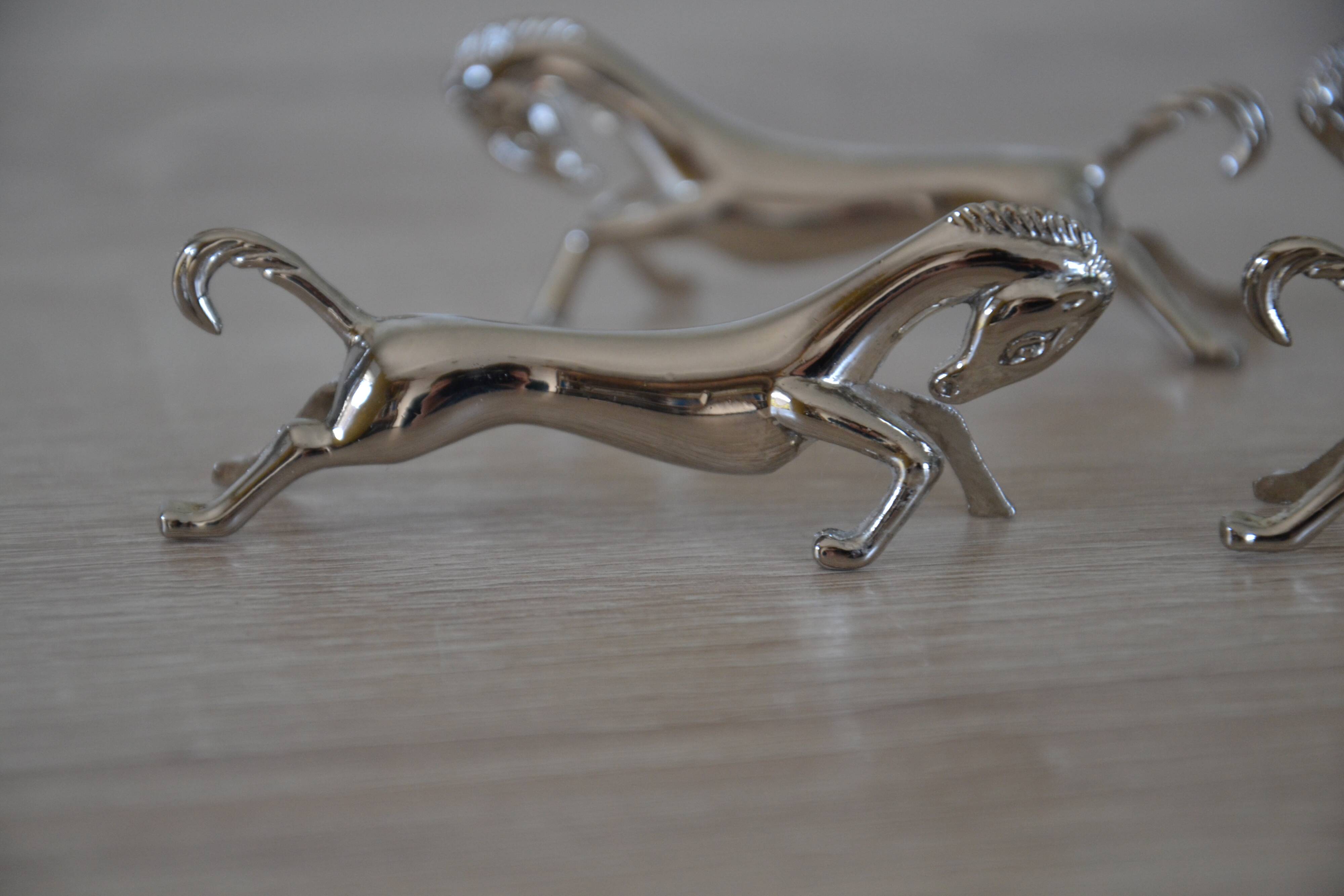6 silver-plated "horse" knife rests