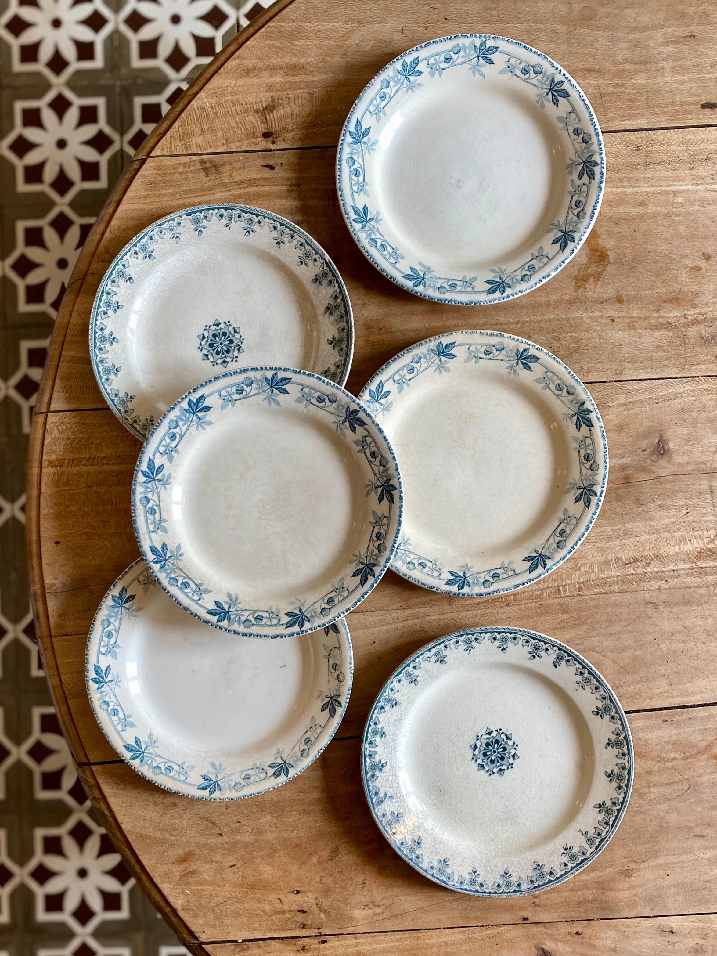 Set of 6 mismatched old iron earth flat plates