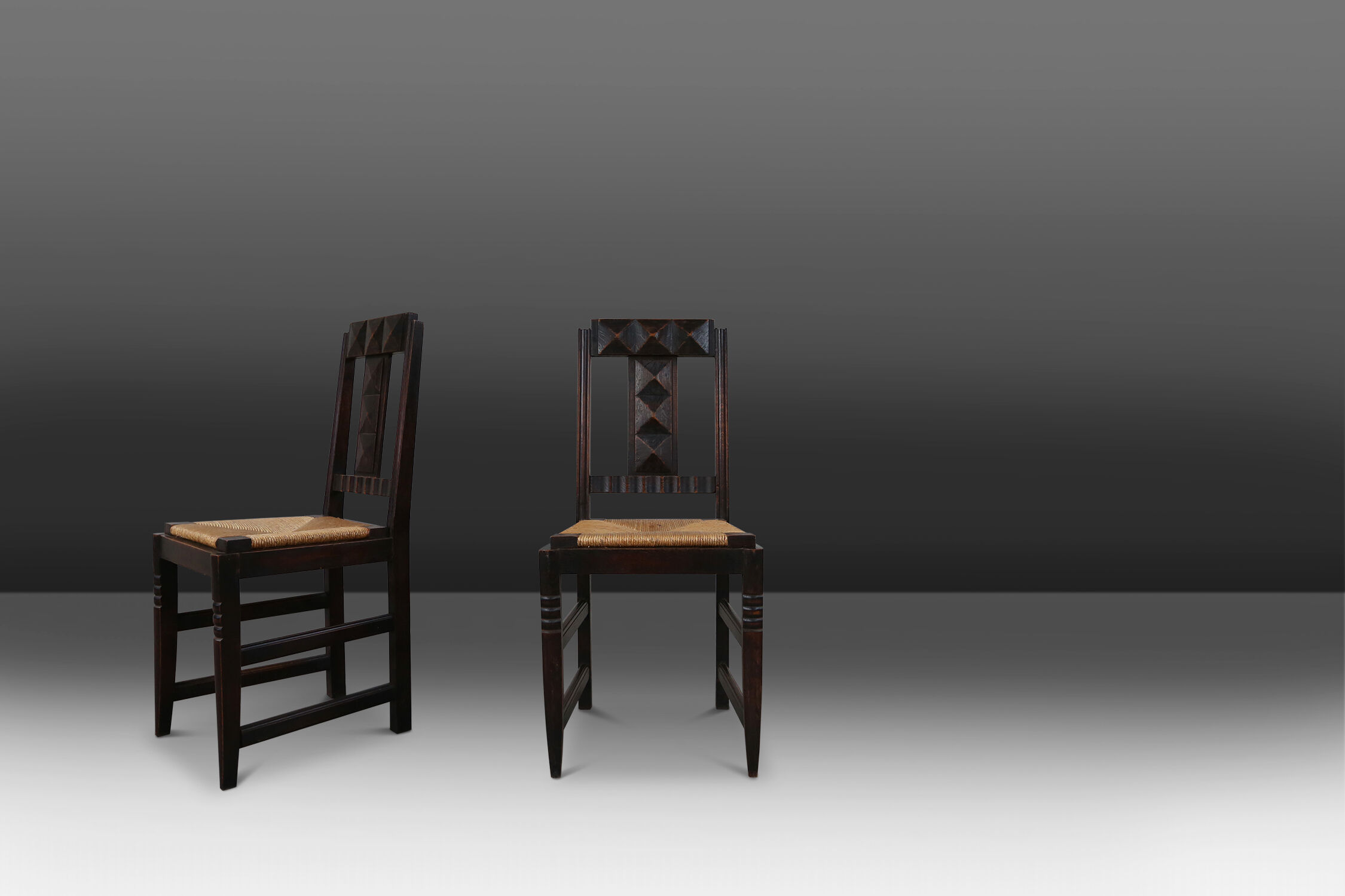 Set of six oak an wicker dining chairs by Victor Courtray