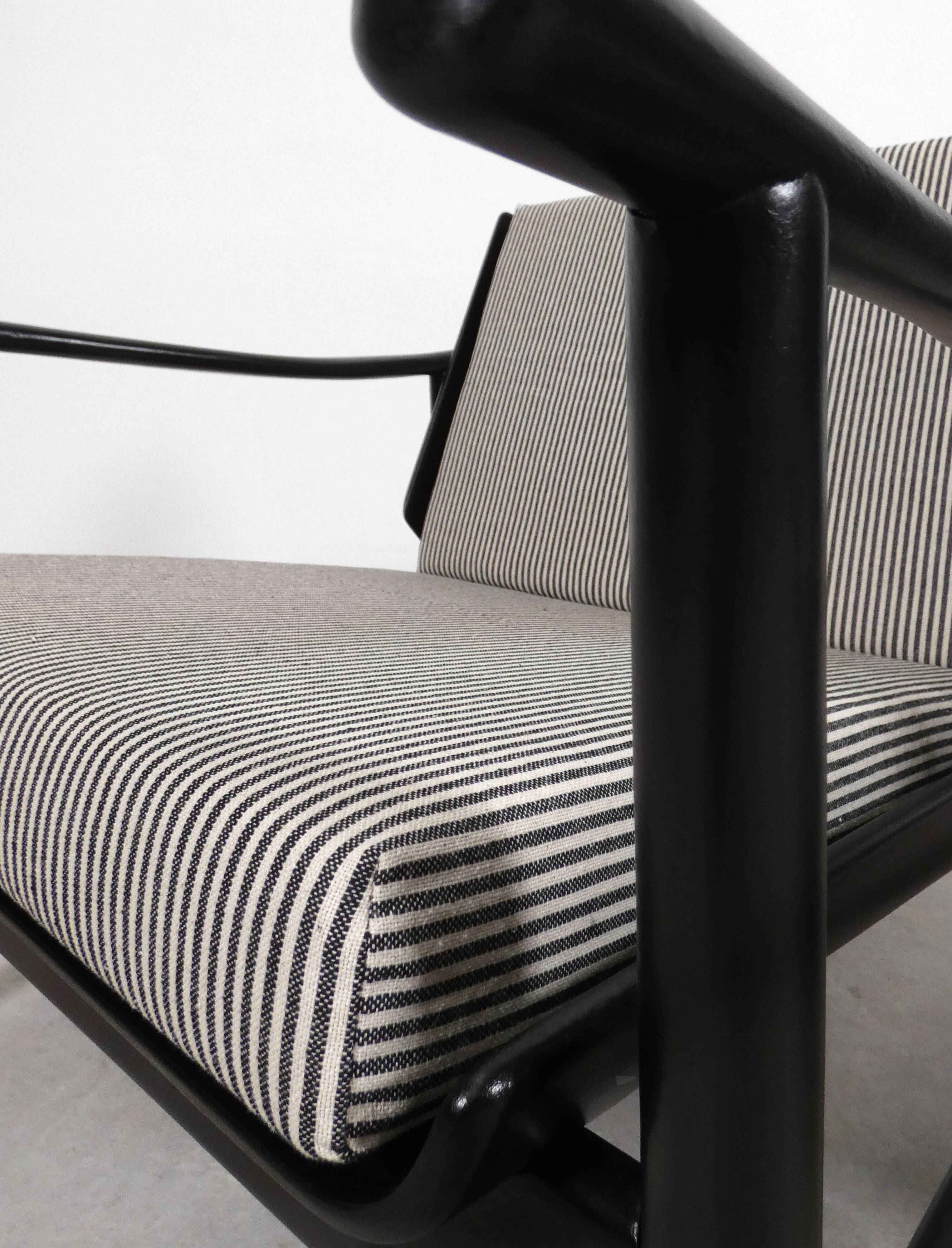 2x wooden Scandinavian arm chairs