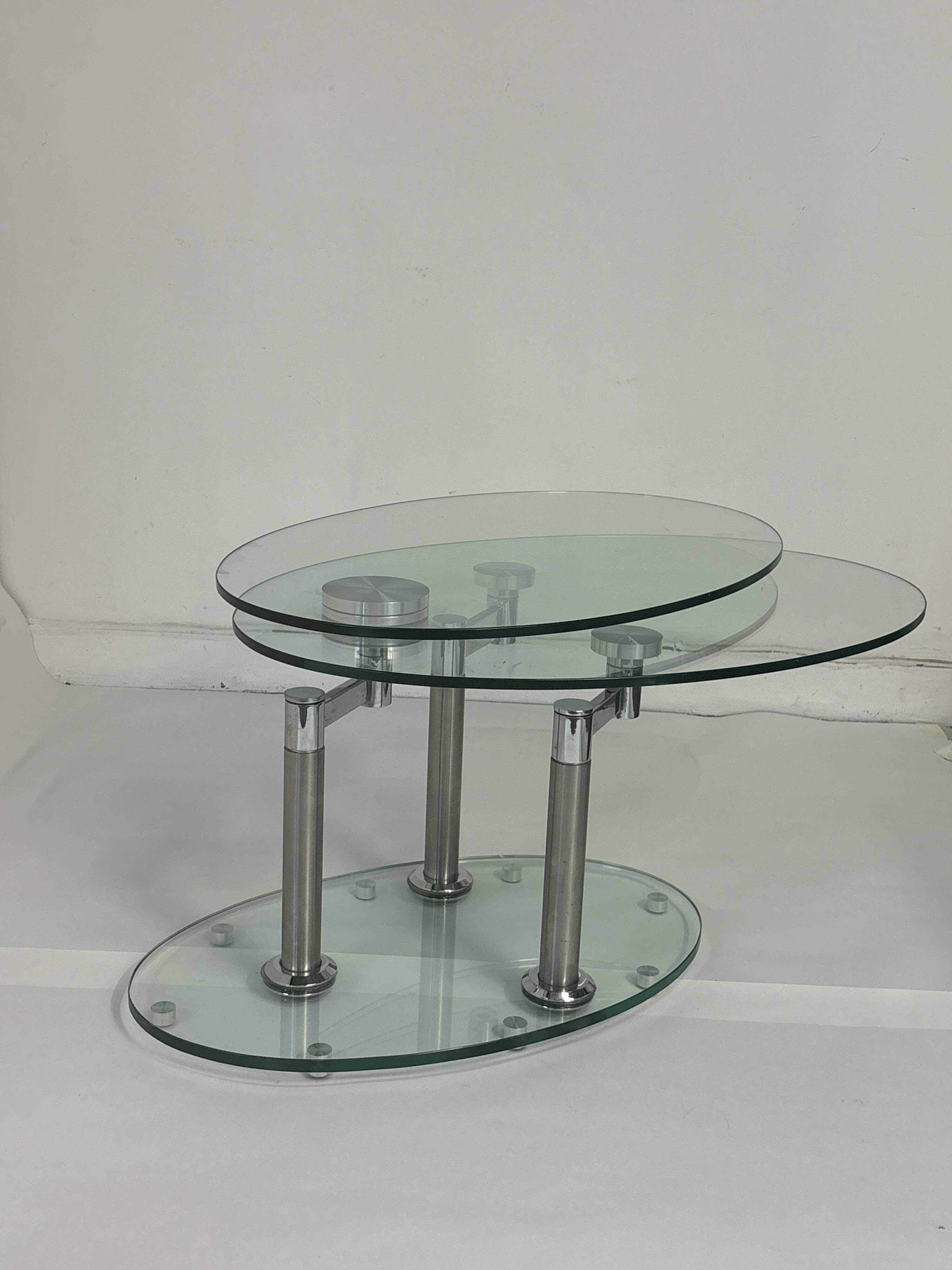 Oval designer coffee table in tempered glass